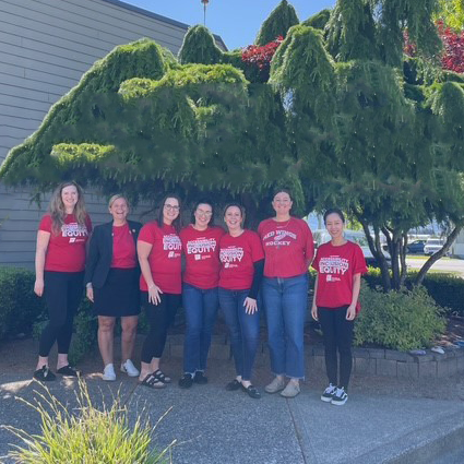 School district staff wear their red shirts for Red Shirt Day. 