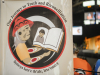 A drawing of an Elder reading a book. Text around the image reads: Our Journey to Truth and Reconciliation. 