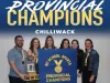 The Girls Curling team poses with their BC Provincial Champions banner. 