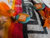 A pin with an orange shirt reads Every Child Matters. 